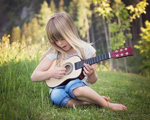 learning guitar child learning guitar child